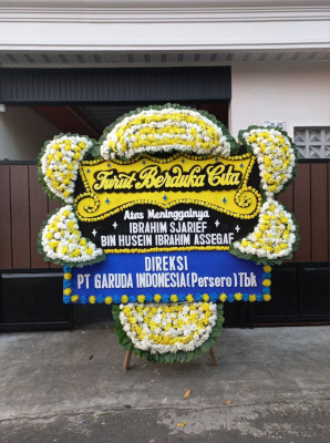 Papan Bunga Duka di Girian Atas