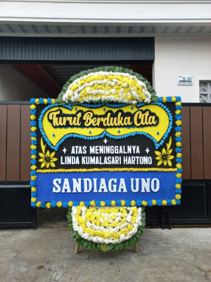 Papan Bunga Duka di Girian Atas